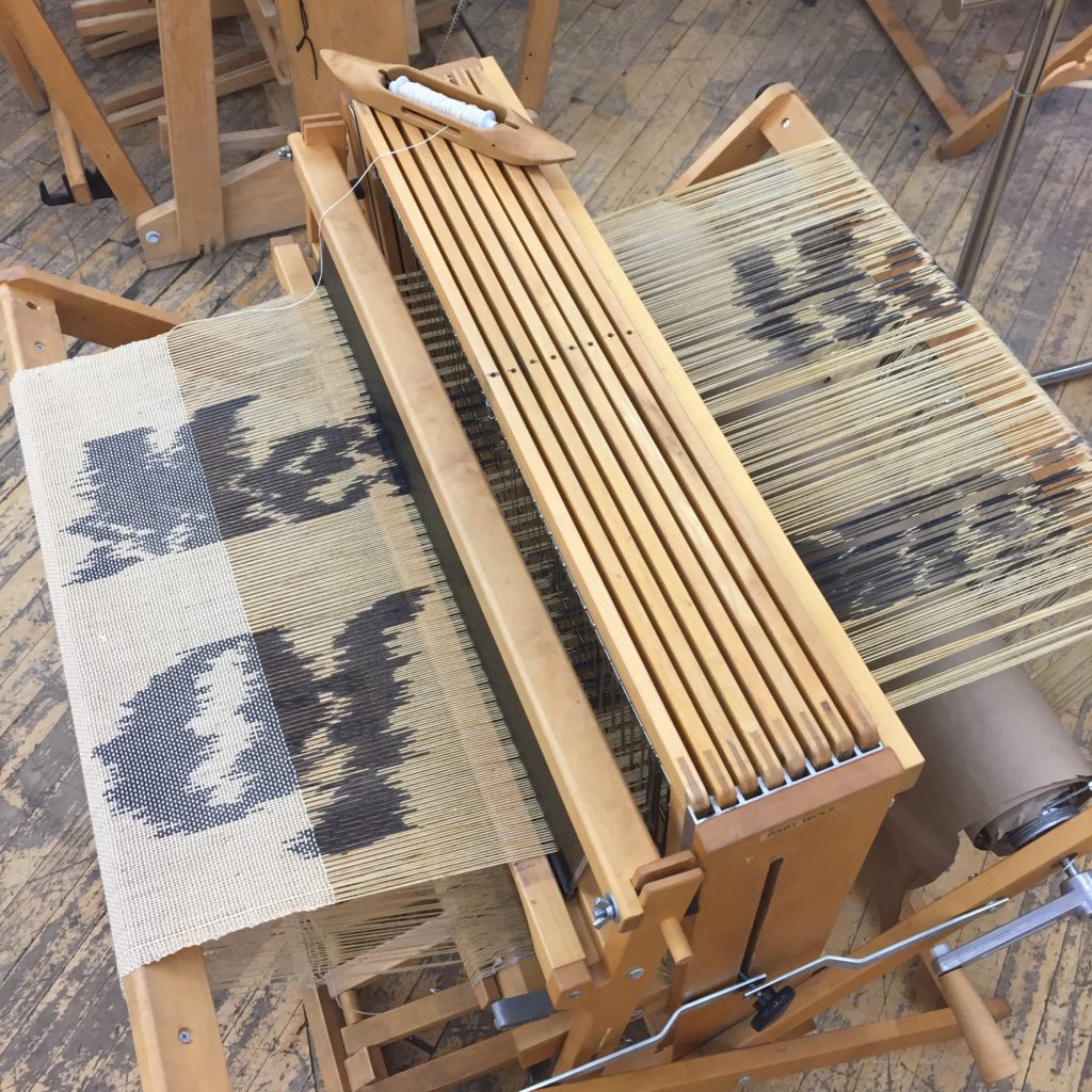 Rowan's work in progress on the loom