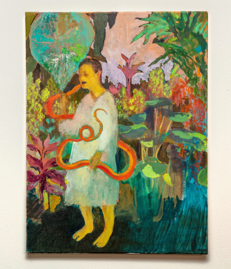 A figure in a white dress eating an orange snake while standing in a garden.